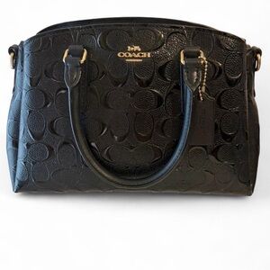 Coach black patent leather signature crossbody bag